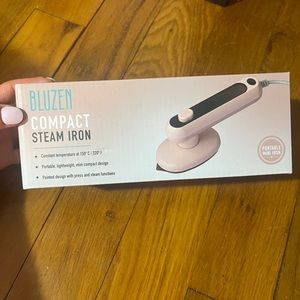 Brand new travel steamer/iron